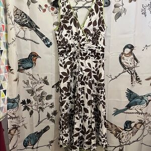 Amanda Lane White and Brown Leaf Print Midi Dress with a liner and green trim.